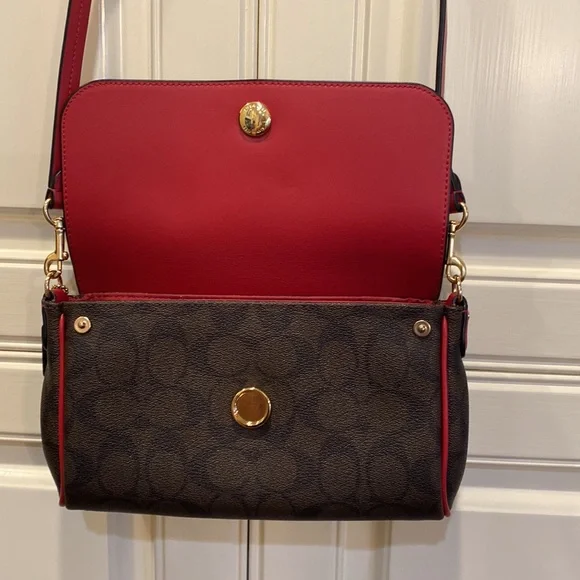 This is a like new coach cross body bag. - Picture 4 of 9